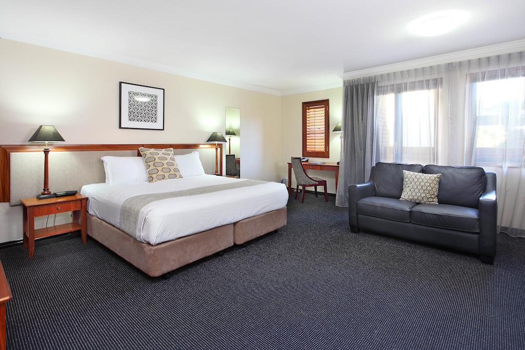 Ramada By Wyndham Brisbane Windsor Hotell Rum bild